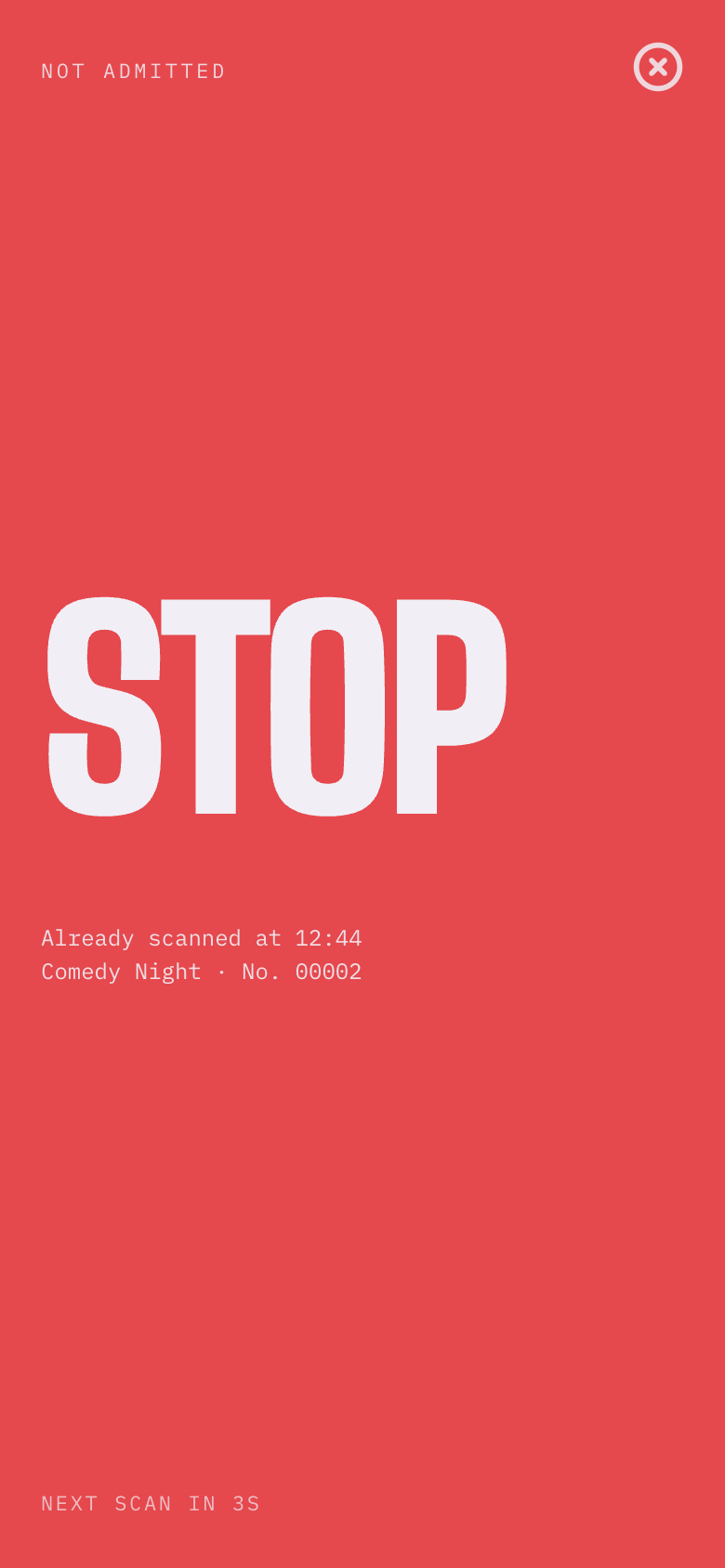 The scanner showing STOP in red with the reason: already scanned