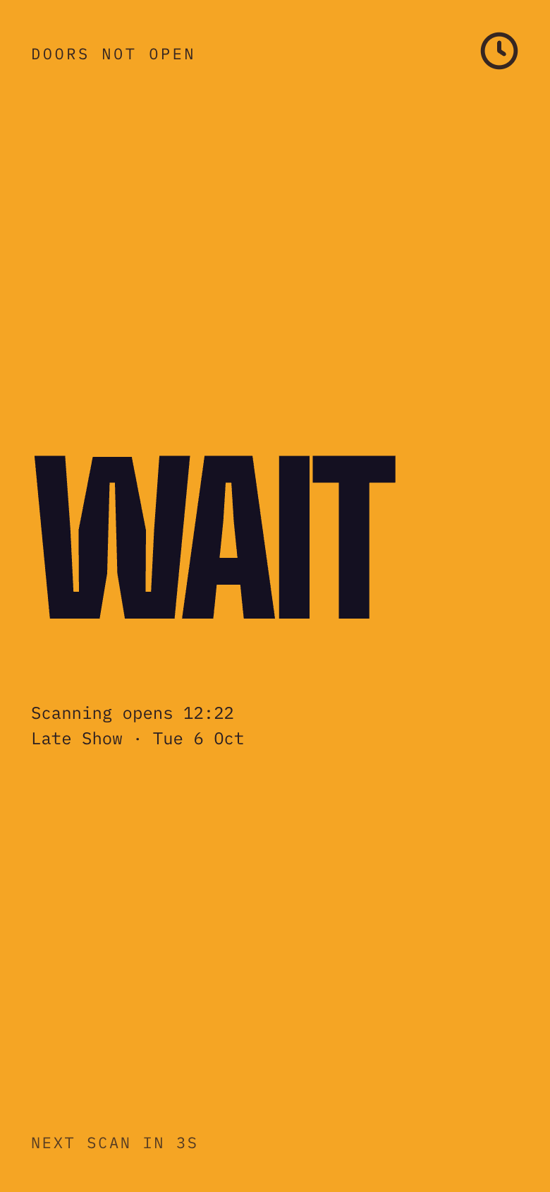 The scanner showing WAIT in amber with the time scanning opens